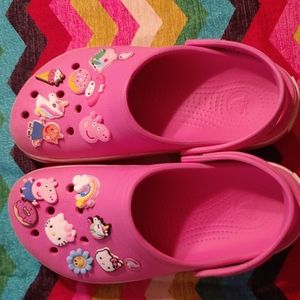 Pink Crocs with jibbits included size 8